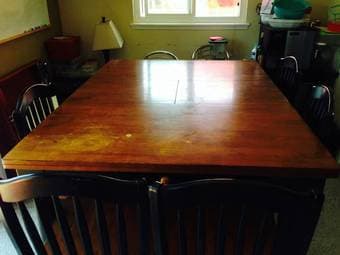 Wood dining table w/ 6 chairs for $150 2
