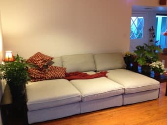 king bed, leaning shelves, two sofas, TV, modems 2