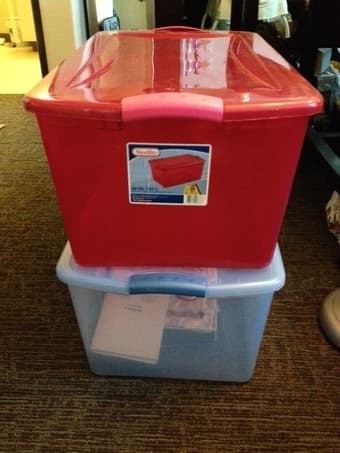 2 big plastic containers selling for $12 1