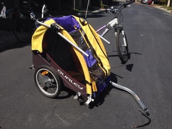 Used women's schwinn (small stature) and single burley solo trailer 1
