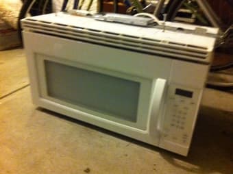 selling over-the-range white microwave 1