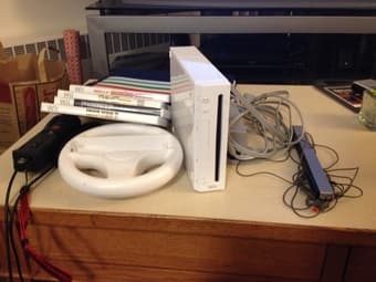 Nintendo Wii console, remote, nunchuck, games, and accessories! $80 1