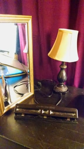 Laptop case, small mirror, desk lamp, hole punch 1