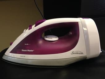 An iron - $10 2