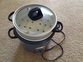 A rice cooker with steam rack - $10 1