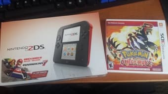 nintendo 2ds (Mario cart 7 included) and pokemon omega ruby 1