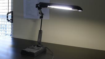 Desk lamp, fluorescent, swing arm, $5 1