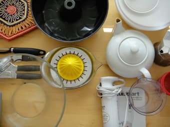 lots of household items: coffee maker, wine opener, can opener... 3