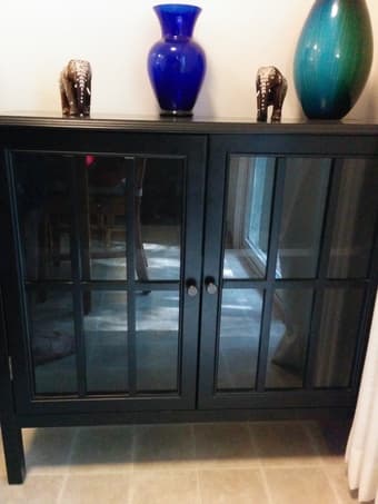Black/brown cabinet with see-through doors $50 obo, 2.5 years old 1