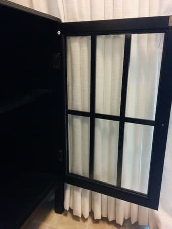 Black/brown cabinet with see-through doors $50 obo, 2.5 years old 3