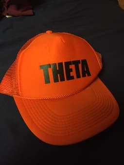 THETA rally trucker hat 1