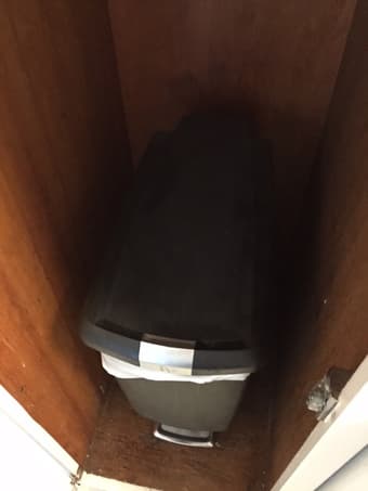 Slim full-size trash can with pedal opener $10 1