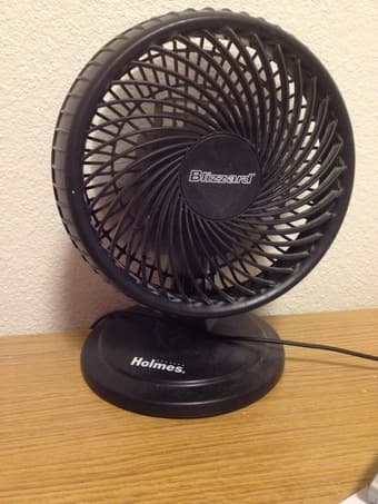 Oscillating black desk fan. $12 OBO 1