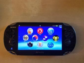 Playstation Vita with many accessories and 3 games - $200 3