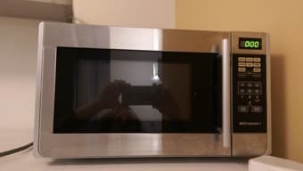 For sale: futon ($40) and microwave ($30) 3