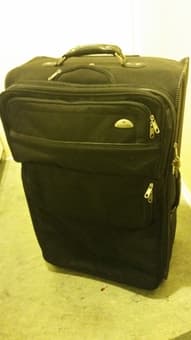 Big comfy chair, TV, suitcase, dishes, wine glasses, etc. 2