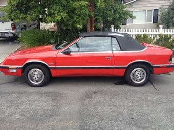 1992 Red Chrystler Le Baron Convertible $1,750 2