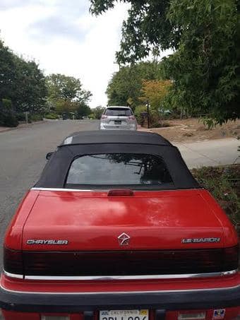 1992 Red Chrystler Le Baron Convertible $1,750 3