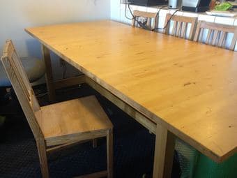 Light wood colored table, seats 8-10 -- $100 2