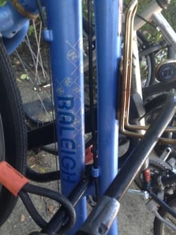 Purple/blue raleigh hybrid bike 3