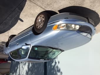 1998 Lincoln Continental with clean smog and title, price $600 OBO 1