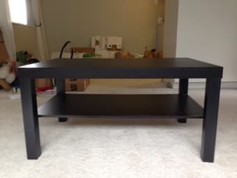 Ikea Black Coffee Table and Wicker Laundry Basket 1