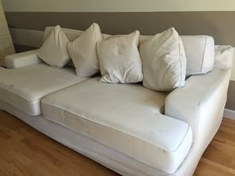 Light Cream colored Ikea Couch + 4 cushions available for $100 1