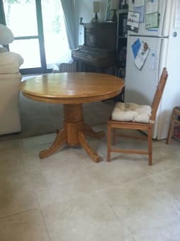 Solid round wood table - $30 obo 1