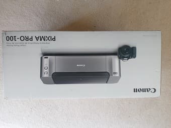 $200 PIXMA Canon Pro-100 Wireless Photo Printer + 13"x19" Photo Paper 1