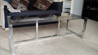 Glass coffee table with silver frame, $25 1