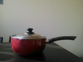 Saucepan with lid, red, $12 1