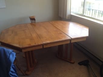 Wooden extendable table with a removable center leaf - $50 1