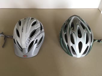 2 bike helmets for sale - $10 each - light green and grey 1