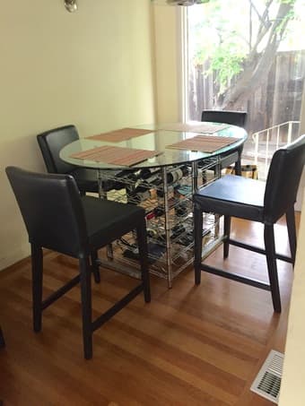 Oval Glass table top and Wine rack base - $100 1