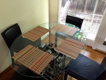 Oval Glass table top and Wine rack base - $100 3