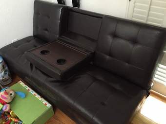 Black leather futon - $100. 2