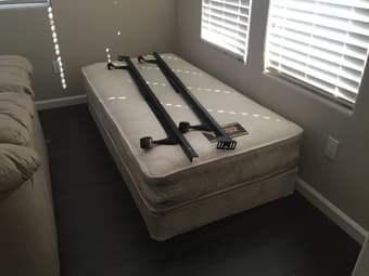 $20 twin size mattress, box spring, and metal frame 1
