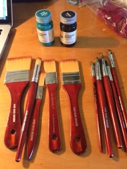 Barely used paintbrushes and acrylic paint (teal and black) 2