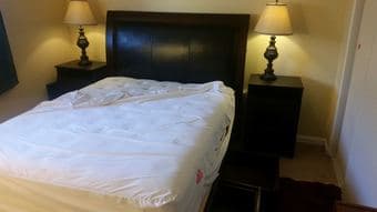 Like new - Bed with storage, mattress, nightstands and lamps - $1250 1
