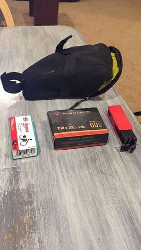 MOVING SALE: Helmet / Saddle bag with tools and new tube 2