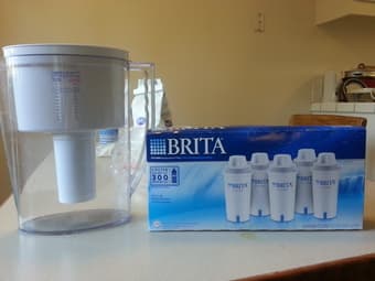 Brita water filter and 5 new replaceable filters  ,  rice maker 1