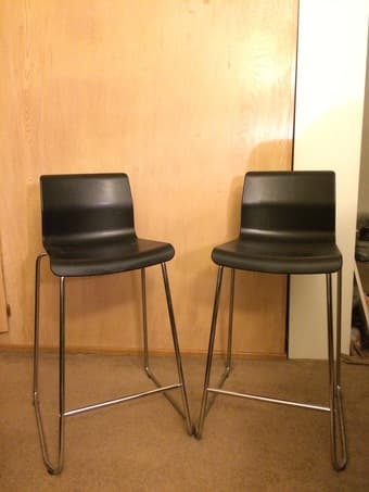 Two black office chairs and two black bar stools for sale 3