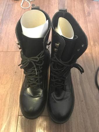 Selling black combat boots 1