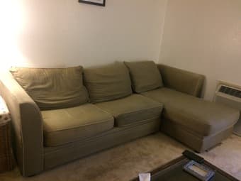 Large, comfortable couch with pullout mattress 1