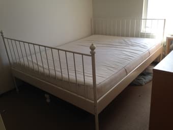 IKEA Queen bed frame, mattress, and wooden slats - $100 1