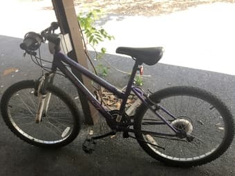 purple bike with lock 1
