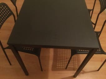 A nice table with four chairs for study or dinning 2