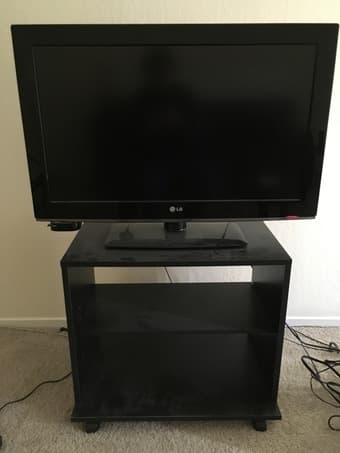 32 inch LG TV (LK330) and FREE TV stand 1