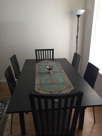 Brand new Extendable black wooden Ikea dining table with 4 chairs 1