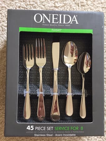 Unopened 45 piece silverware set (Oneida) 1